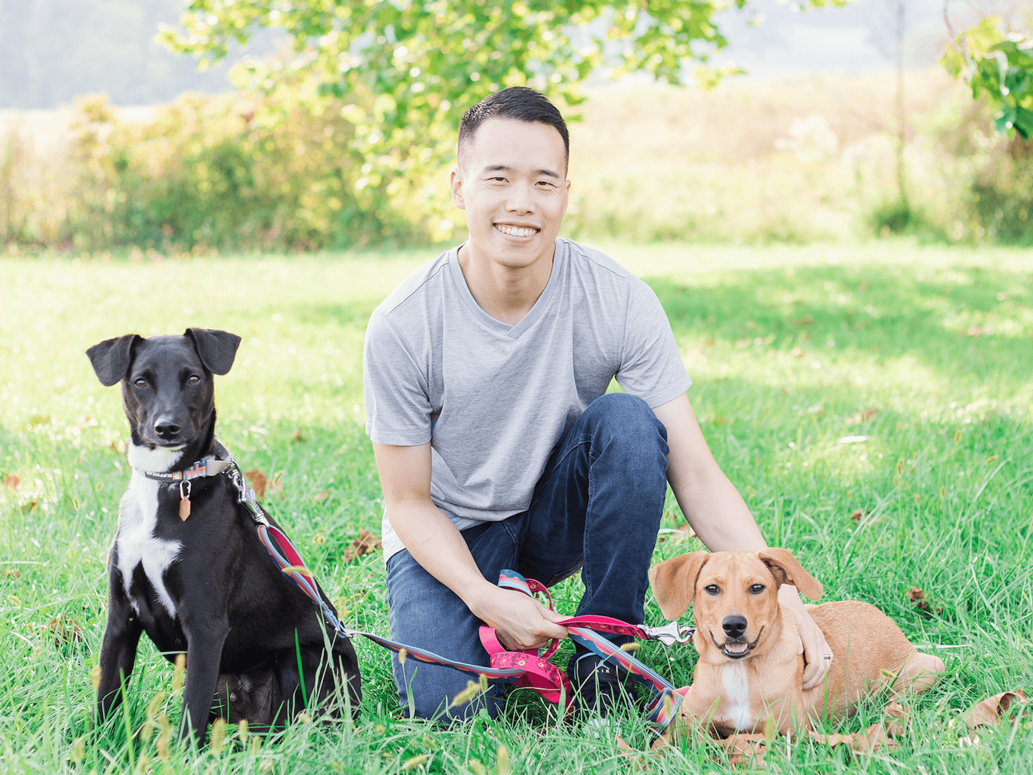 Picture of Simon with his two dogs, Oreo & Mochi